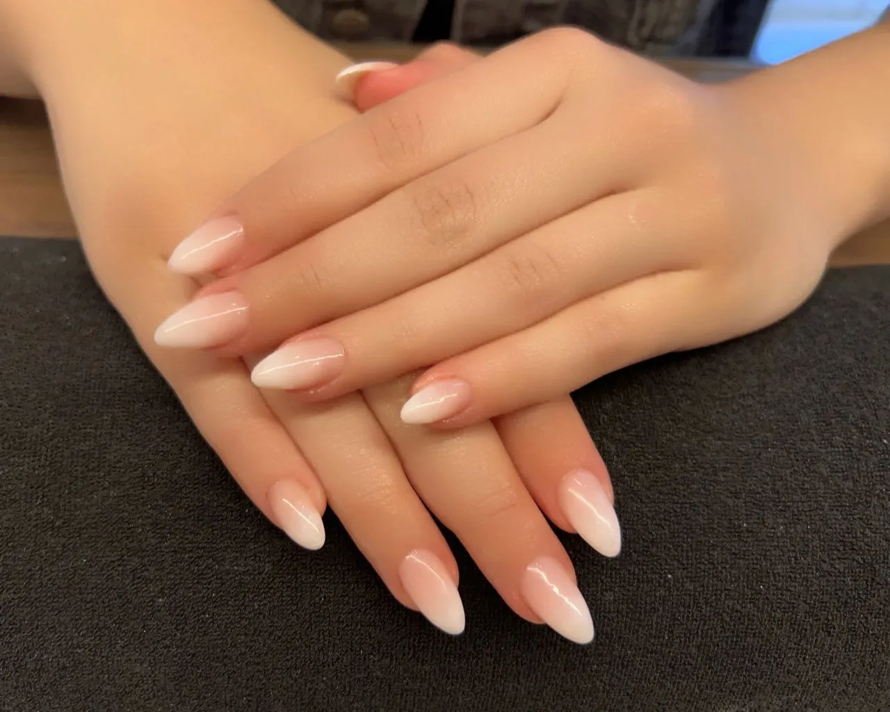 Nail work being finished at the desk